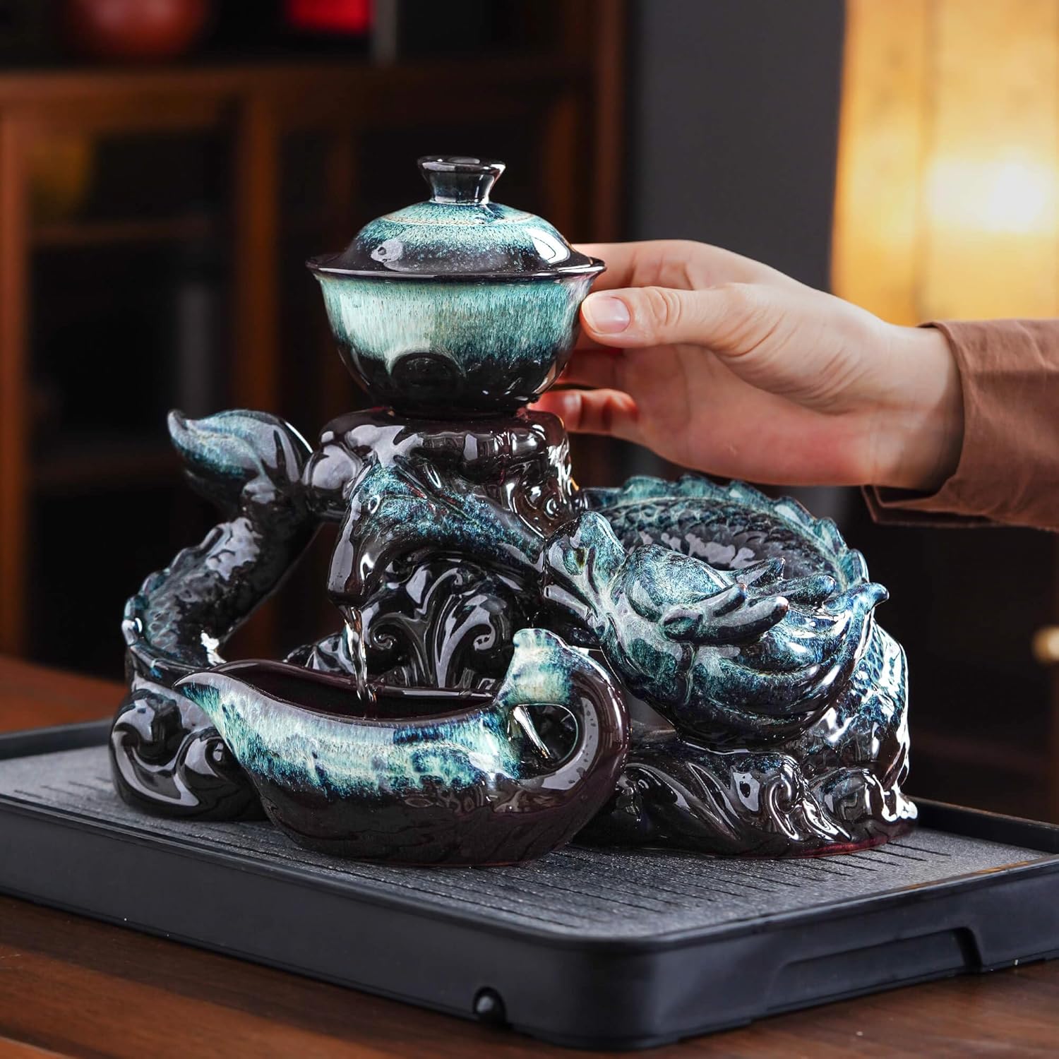 812Y4TwBUzL._AC_SL1500_.jpg Semi Automatic Tea Set Ceramic Teapot with Infuser Magic Teapot with 8 cups Gradient Color (Gradient Dragon- D) - Image 2