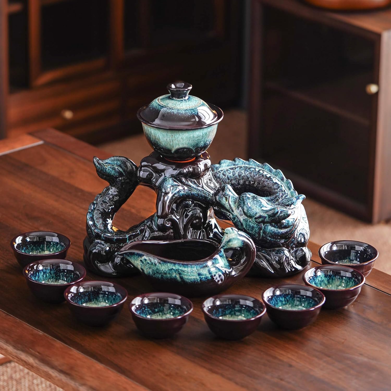 81cuveRAr2L._AC_SL1500_.jpg Semi Automatic Tea Set Ceramic Teapot with Infuser Magic Teapot with 8 cups Gradient Color (Gradient Dragon- D)